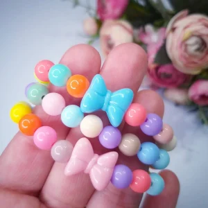 Pulseira de Pérolas Coloridas Lacinho