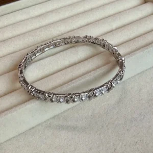 Bracelete inspiração X de zircônias banhado a prata